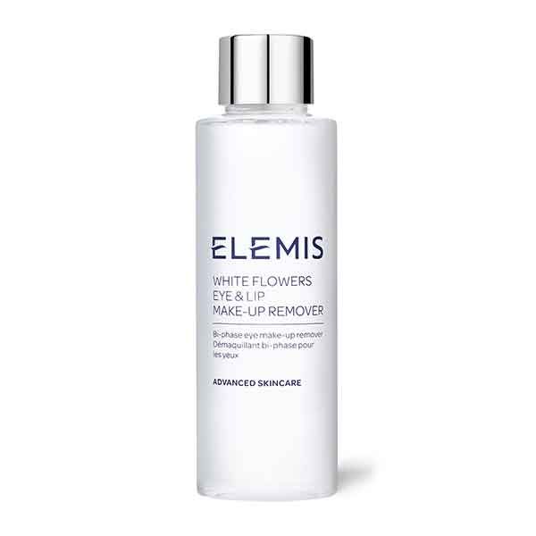 Klare Flasche mit silbernem Deckel. Aufschrift: Elemis White Flowers Eye & Lip Make-Up Remover. Biphase-Augen-Make-up-Entferner.