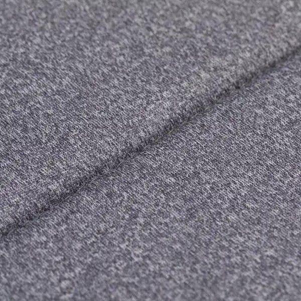 Detailansicht des grauen, melierten Stoffmaterials des FILLIKID Kindersitzes.