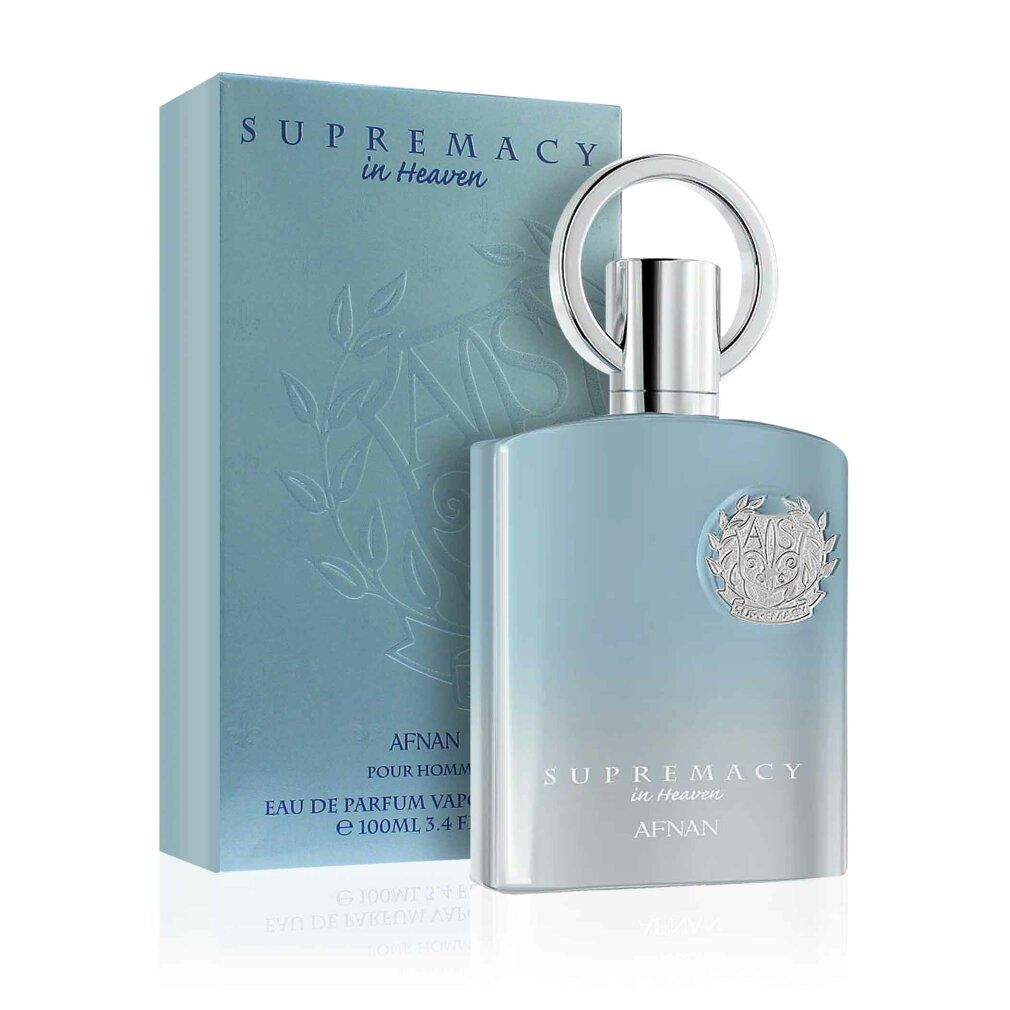 Hellblaues Eau de Parfum mit silbernem Verschluss und Verpackung. Aufschrift: Supremacy in Heaven, Afnan. Flakon und Schachtel.