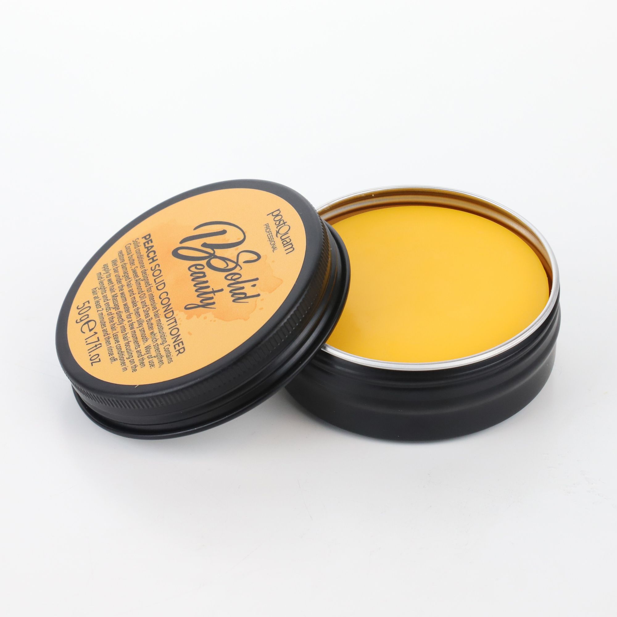 Geöffnete Dose mit gelbem Festspülung. Deckel mit Aufschrift "Solid Beauty" und Produktinformationen. Schwarzer Rand.