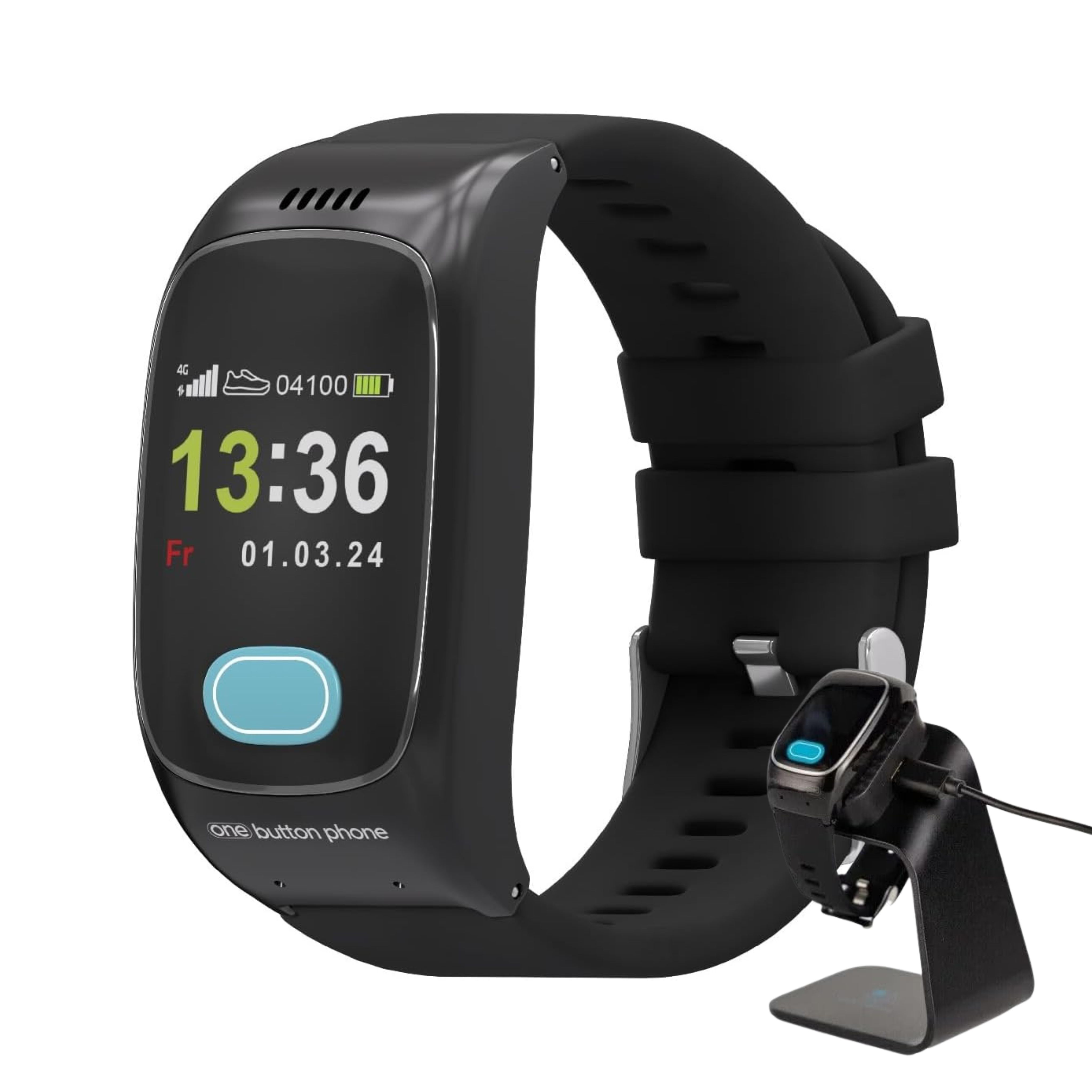 Schwarzes One Button Phone mit Armband und Ladestation. Uhrzeit und Datum auf Display. Ladestation mit Ladekabel.