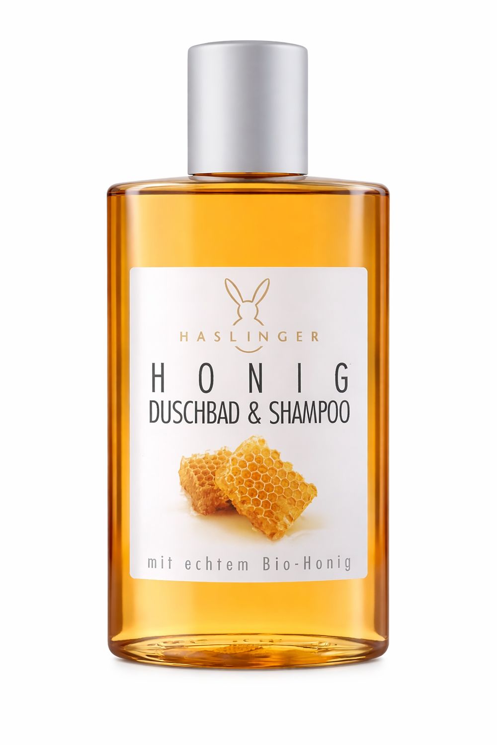 Flasche mit Honig-Duschbad & Shampoo. Weißes Etikett mit Produktnamen und Honigwaben-Illustration. Silberner Deckel.