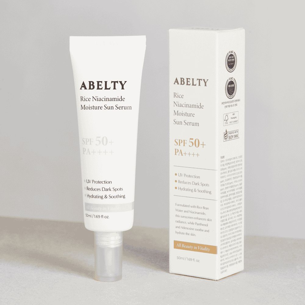 ABELTY Rice Niacinamide Moisture Sun Serum in weißer Tube und Verpackung.