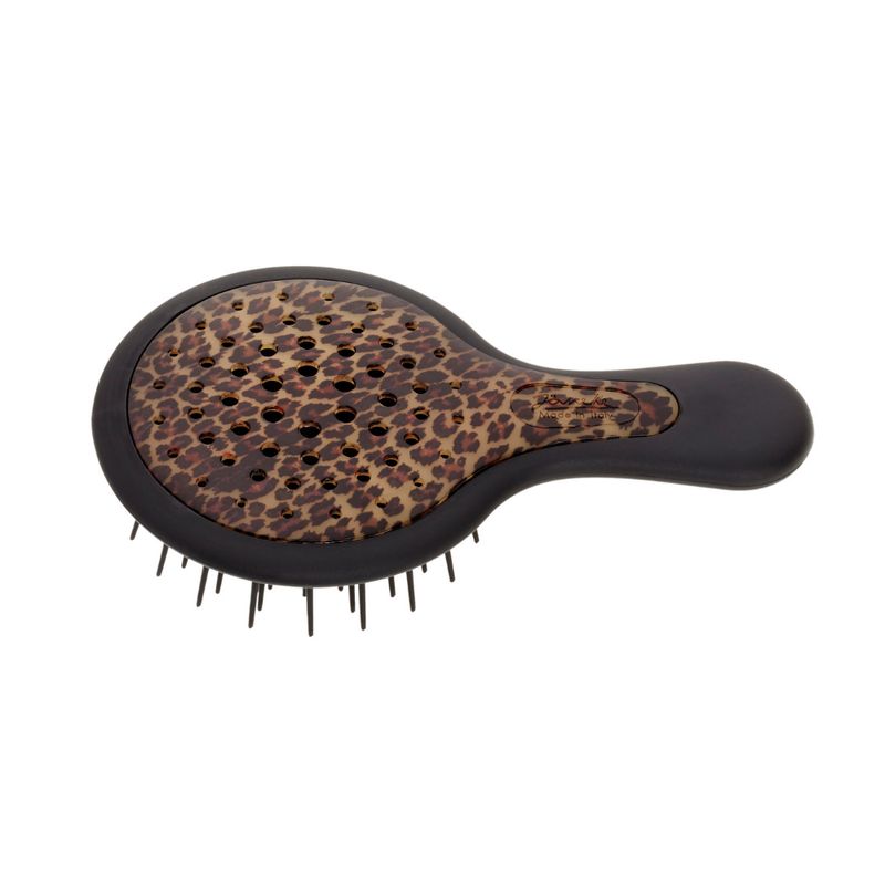 Schwarze Haarbürste mit braunem Leopardenmuster. Ovaler Bürstenkopf mit Griff. Schwarze Borsten.