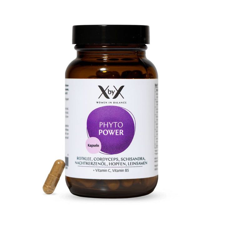 Braune Flasche mit Kapseln und eine einzelne Kapsel daneben. Lila Etikett.