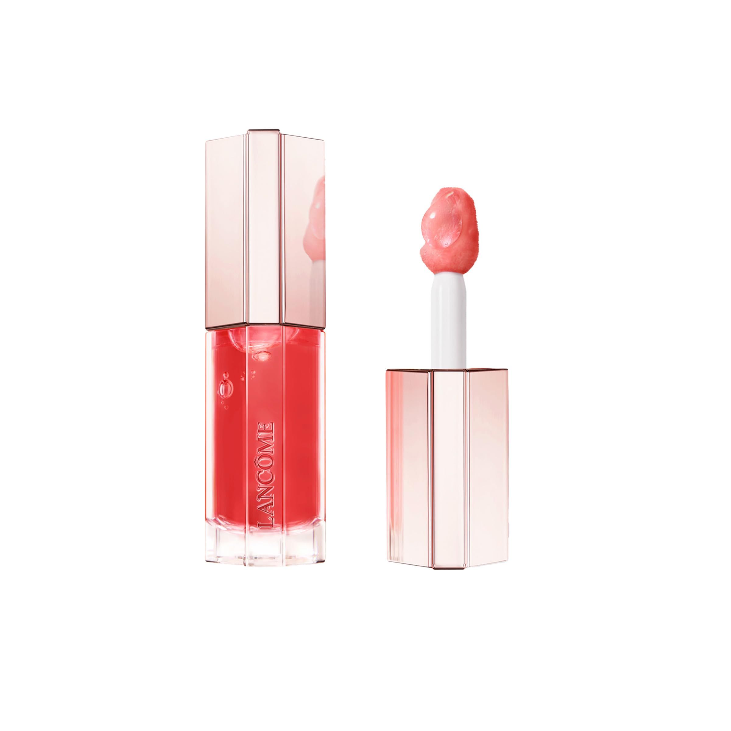 Lancôme Juicy Tubes Lipgloss. Rosa Farbton. Applikator und Behälter in Roségold. Geöffnet, Applikator sichtbar.