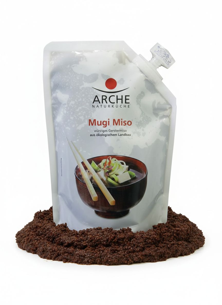 Arche Mugi Miso Standbeutel, umgeben von Mugi Miso Paste.