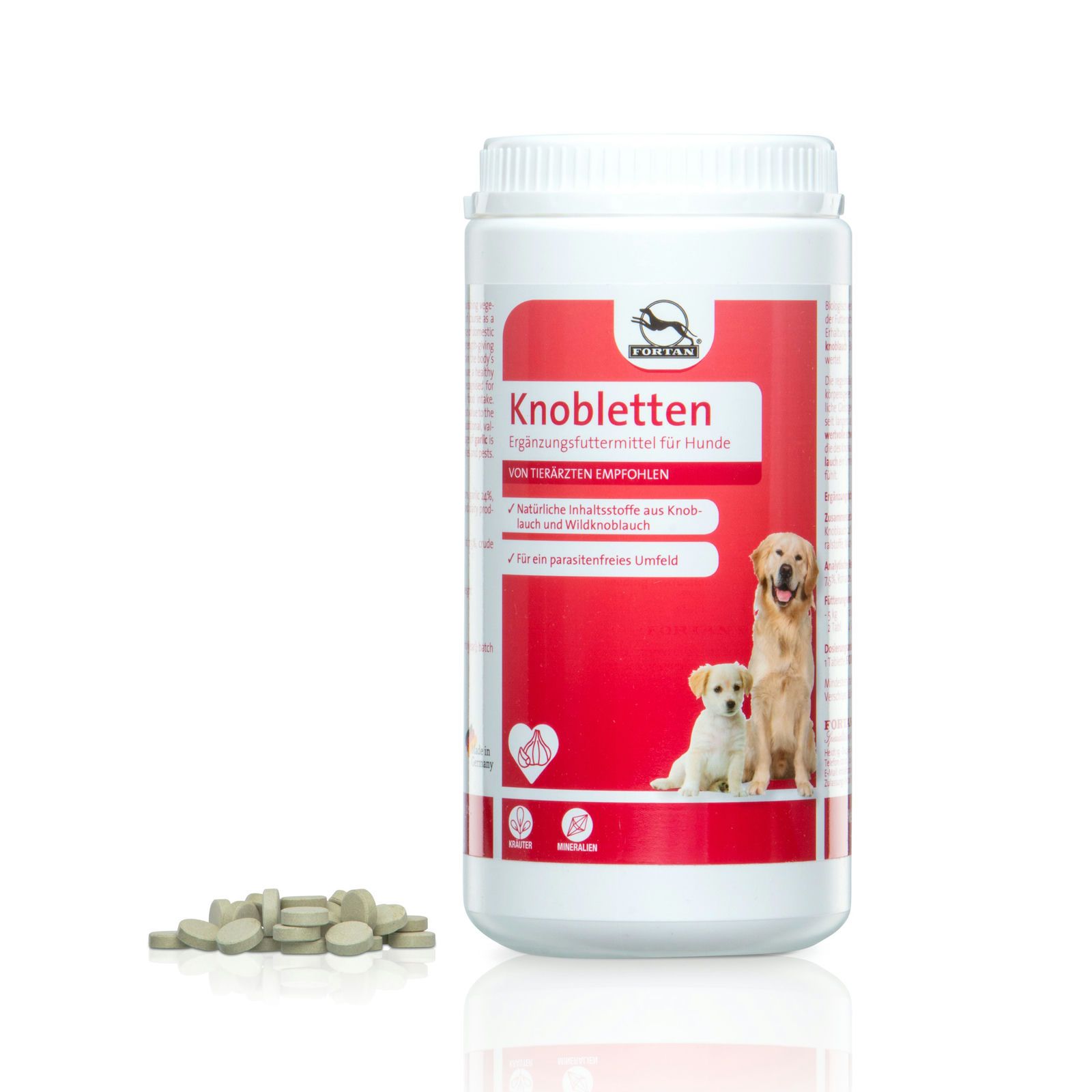 Weiße Dose mit rotem Etikett. Text: Knobletten, Ergänzungsfuttermittel für Hunde. Abbildung: zwei Hunde. Tabletten daneben.