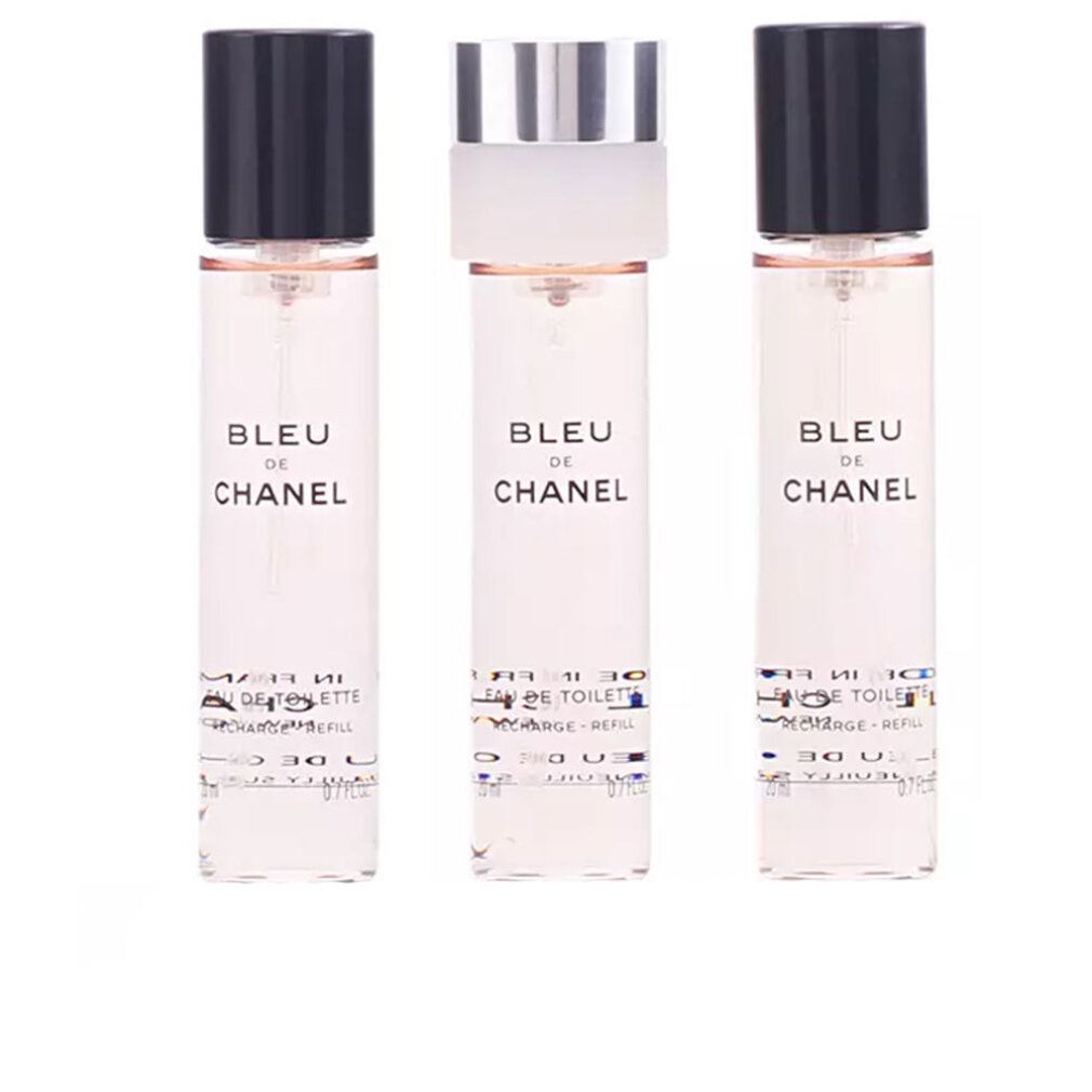 Drei kleine Parfümflakons von Bleu de Chanel Paris.