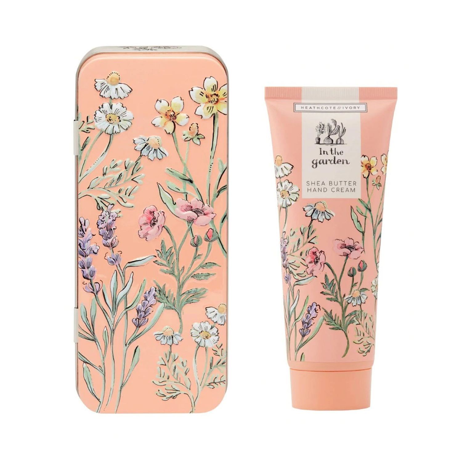 Handcreme und Dose mit floralem Muster. Aufschrift: In the Garden, Shea Butter Hand Cream. Marke: Heathcote & Ivory.