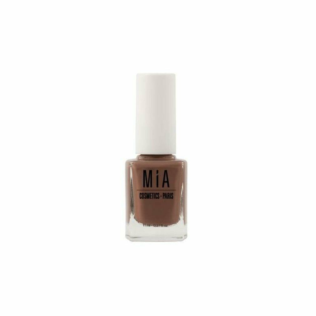 Nagellackflasche mit brauner Farbe und weißem Deckel. Aufschrift: Mía Cosmetics Paris. Volumen: 11 ml.