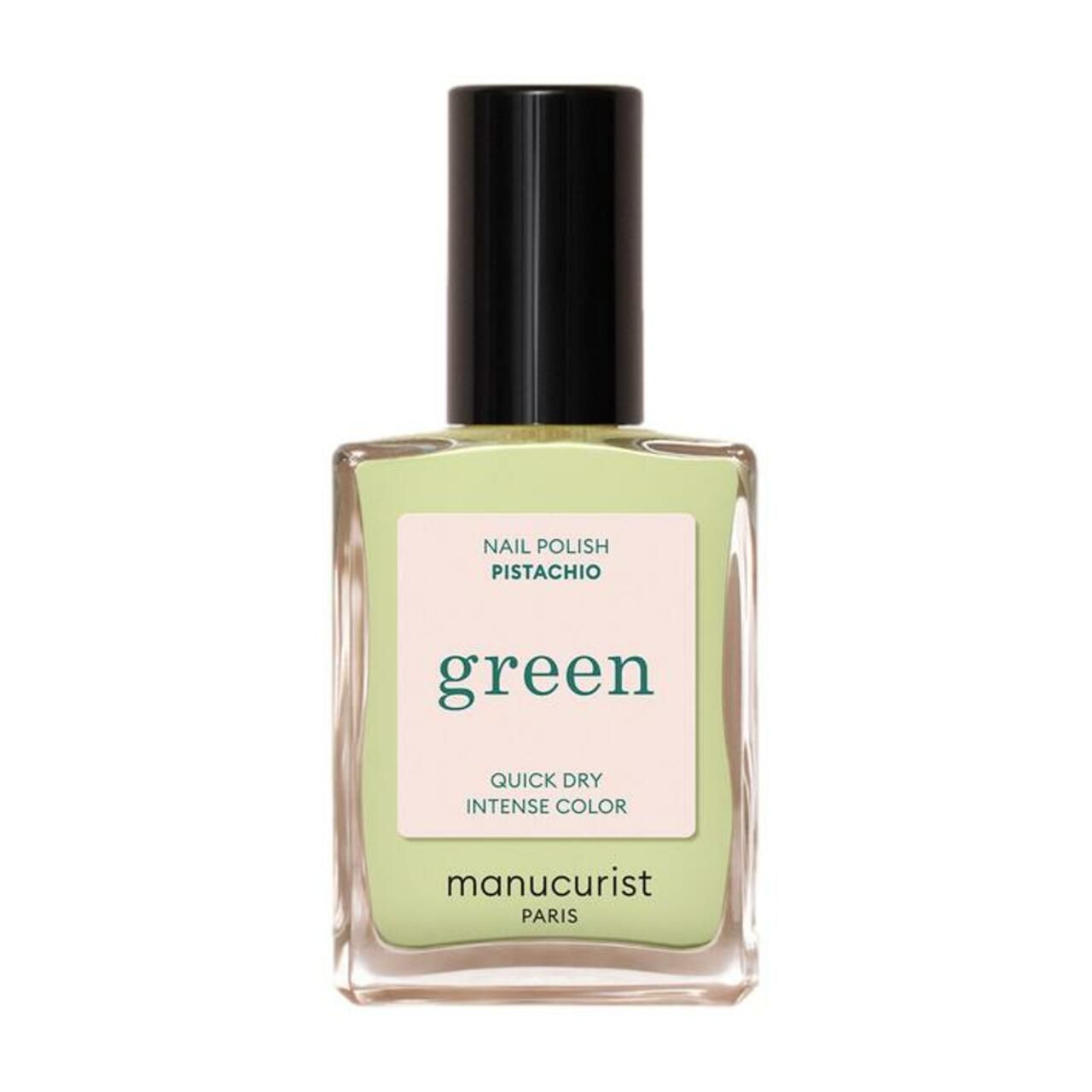 Grüner Nagellack in einer quadratischen Glasflasche mit schwarzem Deckel. Aufschrift: Nail Polish Pistachio, green, Manucurist.