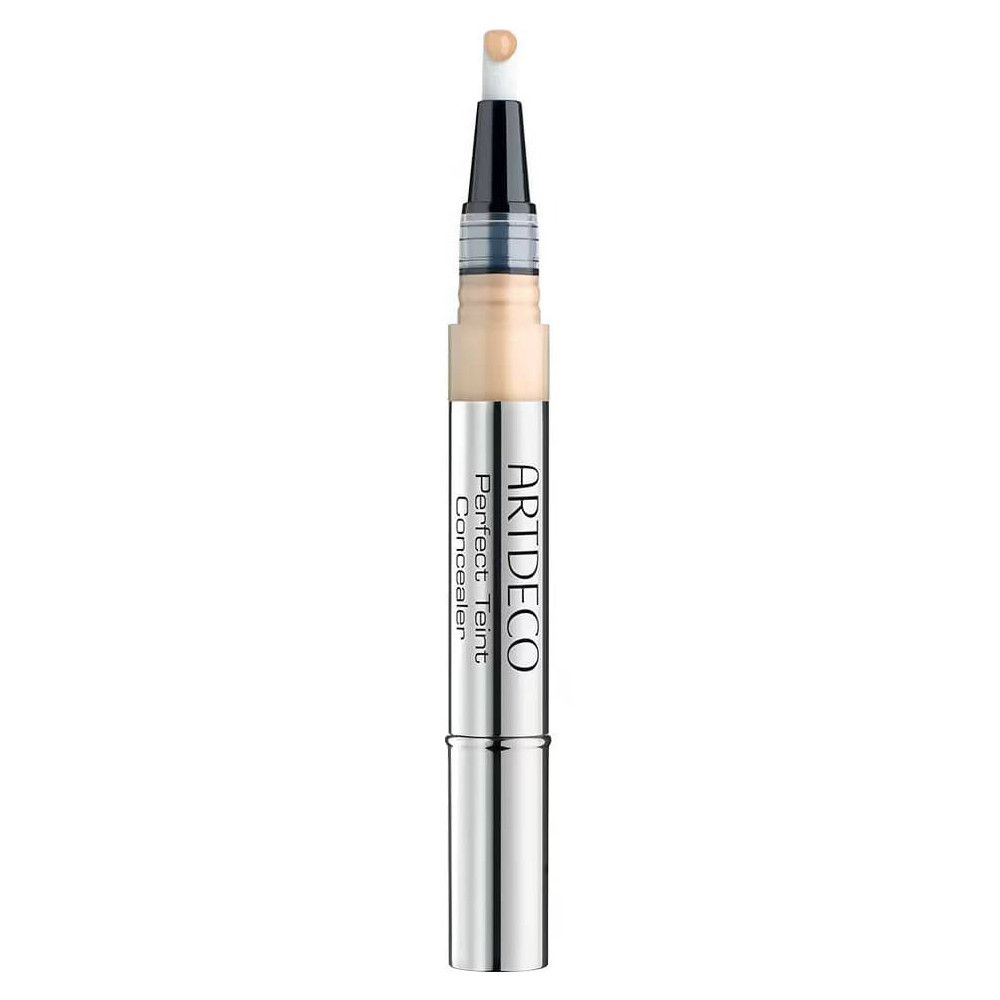 Artdeco Korrektor Perfekter Teint, silberfarbener Stift mit Applikator. Beige Flüssigkeit sichtbar.