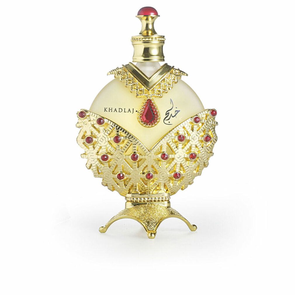 Goldfarbene Flasche mit rotem Schmuck. Aufschrift: KHADLAJ. Konzentriertes Ölparfüm.