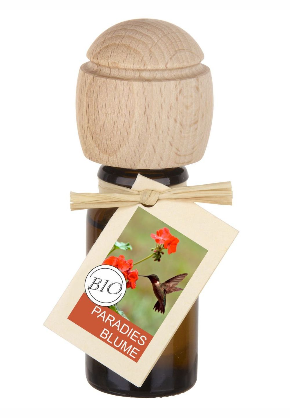 Braune Glasflasche mit Holzverschluss und Etikett. Etikett mit Bild von Blume und Kolibri, Text: BIO Paradies Blume.