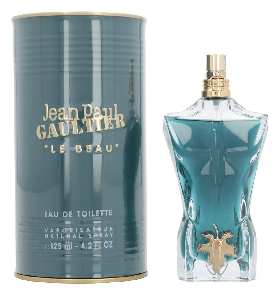 Jean Paul Gaultier Le Beau E.d.T. Flakon und Dose. Flakon in Torsoform, blaues Glas, goldfarbener Verschluss.