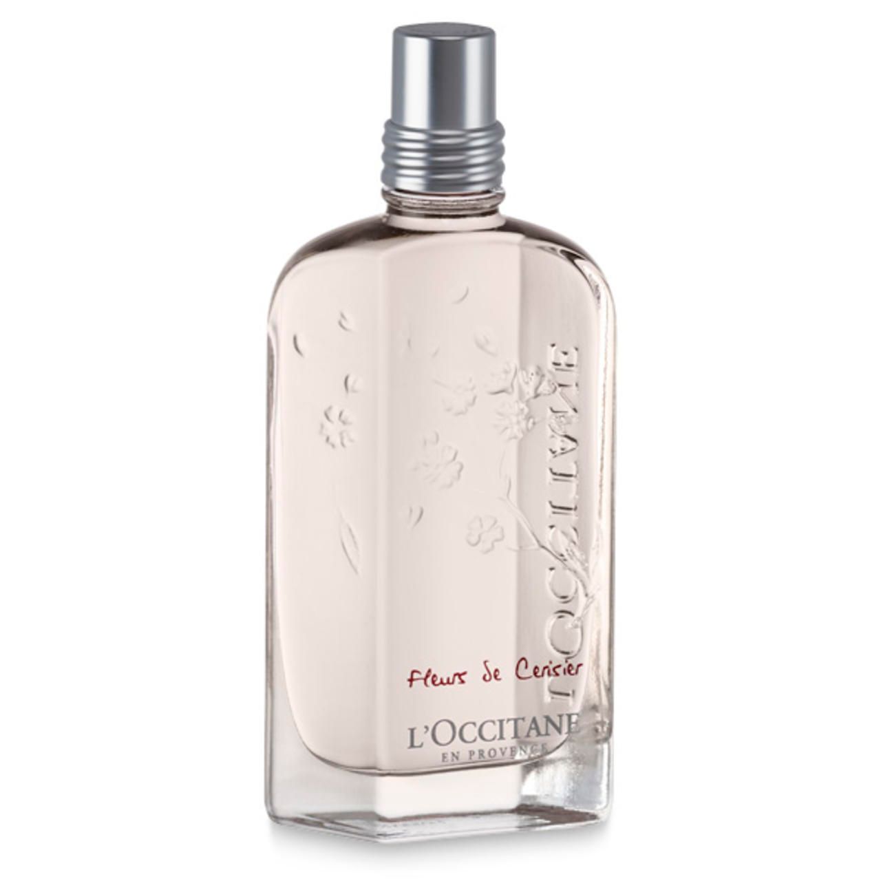 Kirschblüte E.d.T. Splash-Flasche, rosa Flüssigkeit, silberner Verschluss, L'Occitane-Logo, Schriftzug 'Fleur de Cerisier'.