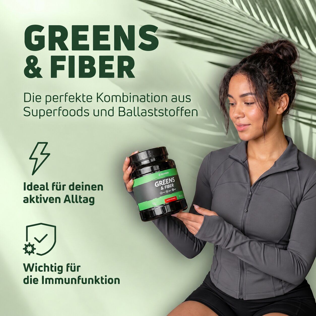 Frau hält Dose Greens & Fiber. Text: Die perfekte Kombination aus Superfoods und Ballaststoffen. Ideal für den aktiven Alltag und die Immunfunktion.