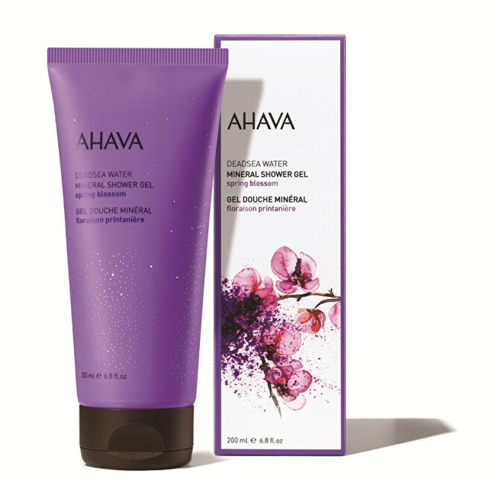Lila Tube und Schachtel. AHAVA-Schriftzug. Text: DEADSEA WATER Mineral Shower Gel Spring Blossom. Orchideen-Design auf der Schachtel.