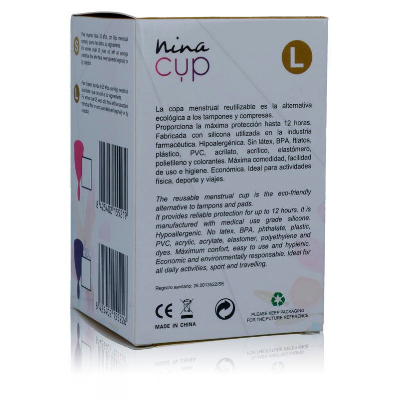 Rückseite der Verpackung. Text in Englisch und Spanisch. Informationen zur Menstruationstasse, Inhaltsstoffe, Zertifizierungen.