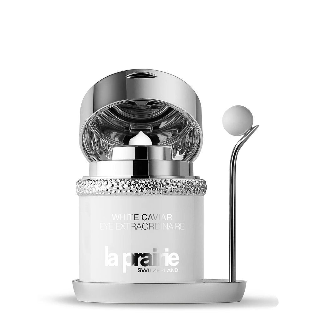 Weißer Tiegel mit silberfarbenem Deckel und Applikator. Aufschrift: White Caviar Eye Extraordinaire, La Prairie.
