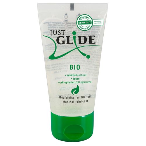 Transparentes Gel in einer Tube mit grünem Verschluss. Aufschrift: Just Glide Bio, pH-optimiert, vegan. Dermatest-Siegel.