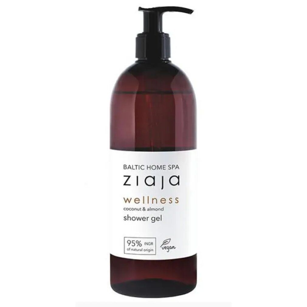 Braune Flasche mit schwarzem Pumpverschluss. Weißes Etikett mit Text: ZIAJA, wellness, coconut & almond shower gel. Vegan-Siegel.