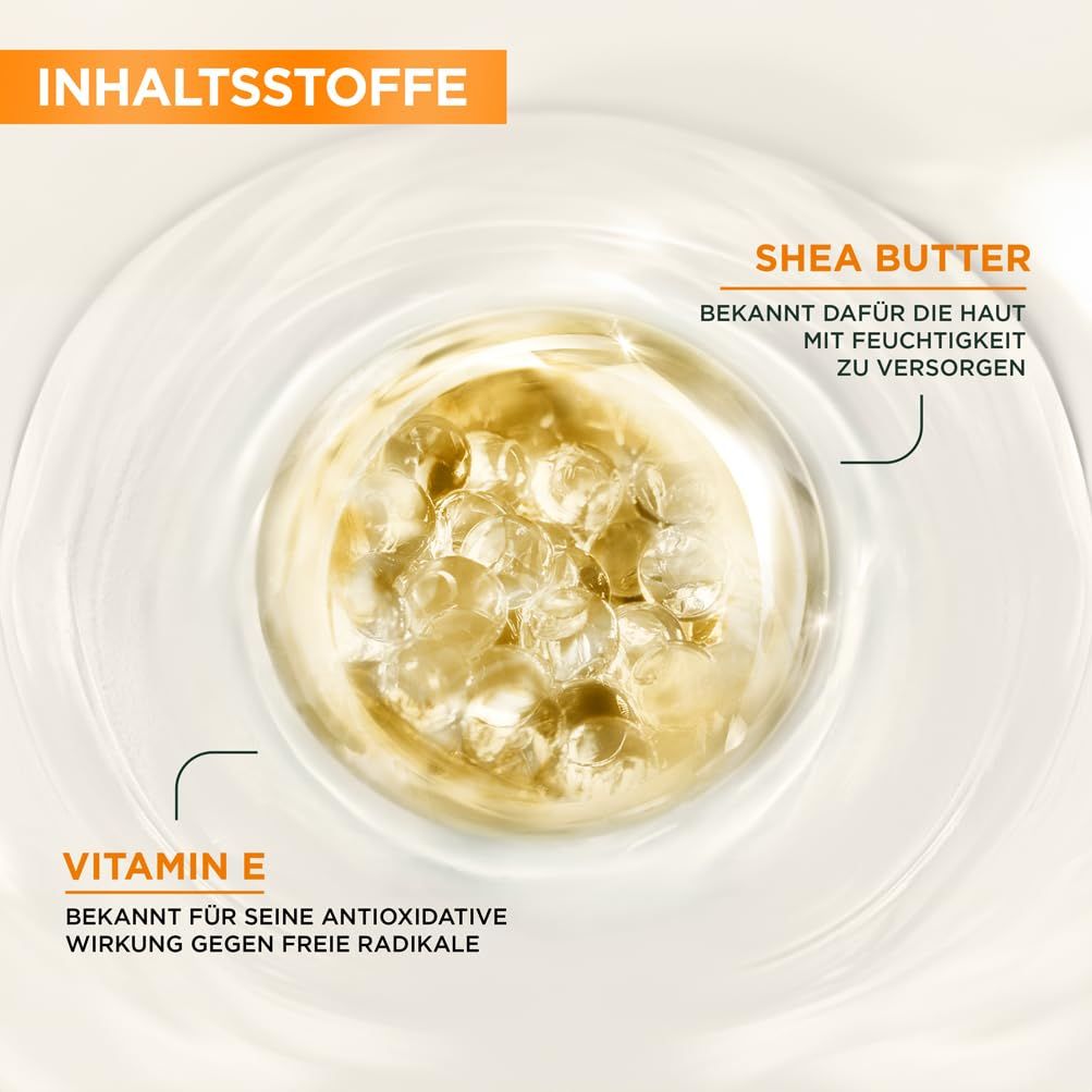 Nahaufnahme von Inhaltsstoffen. Text: Sheabutter, Vitamin E. Bekannt für feuchtigkeitsspendende und antioxidative Wirkung.