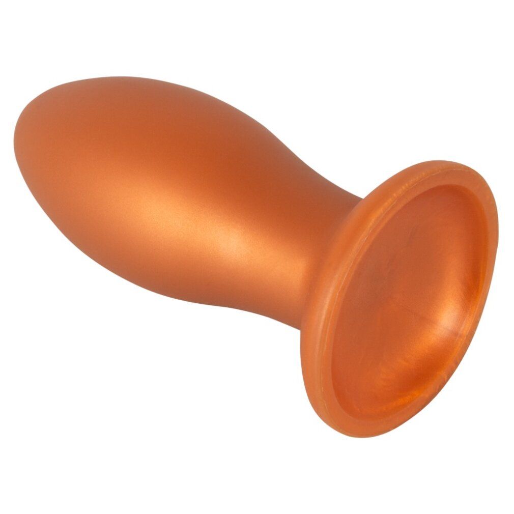 Orangefarbener Analplug, seitliche Ansicht. Breiter, flacher Sockel.