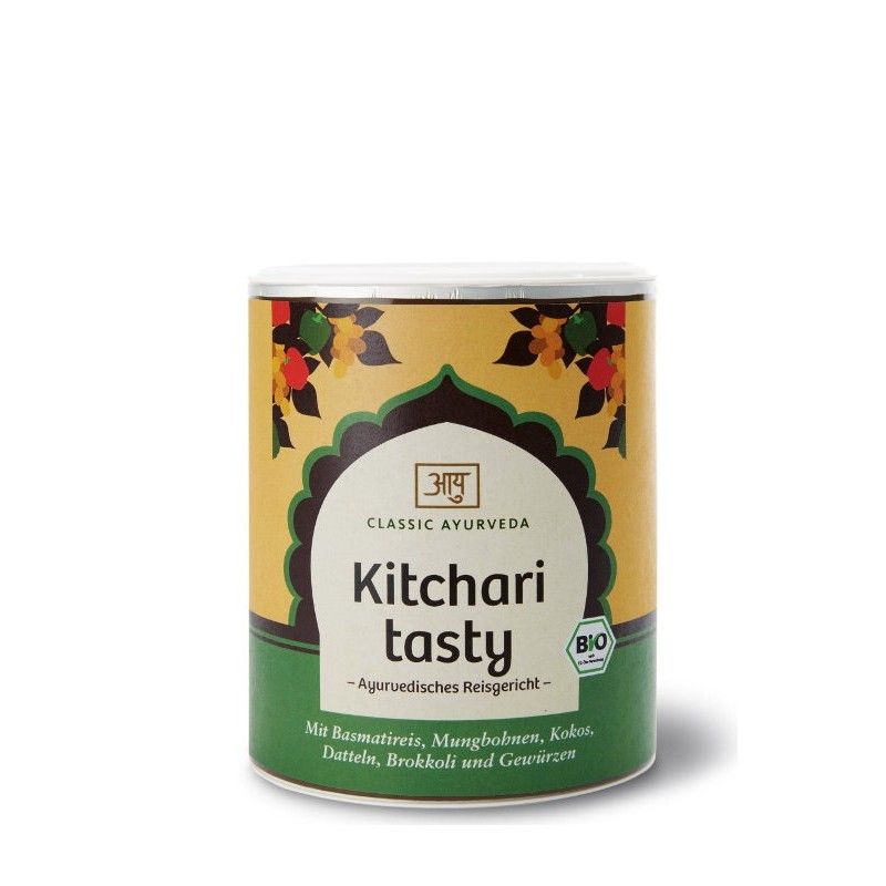 Zylindrische Dose mit Aufschrift "Kitchari tasty". Grün-gelbes Design mit Logo und Bio-Siegel. Enthält Basmatireis, Mungbohnen, Kokos, Datteln, Brokkoli und Gewürze.
