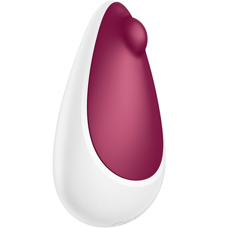 Weiß-lila Vibrator. Tropfenförmig mit weißem Gehäuse und lila Innenseite. Erhöhte Spitze.