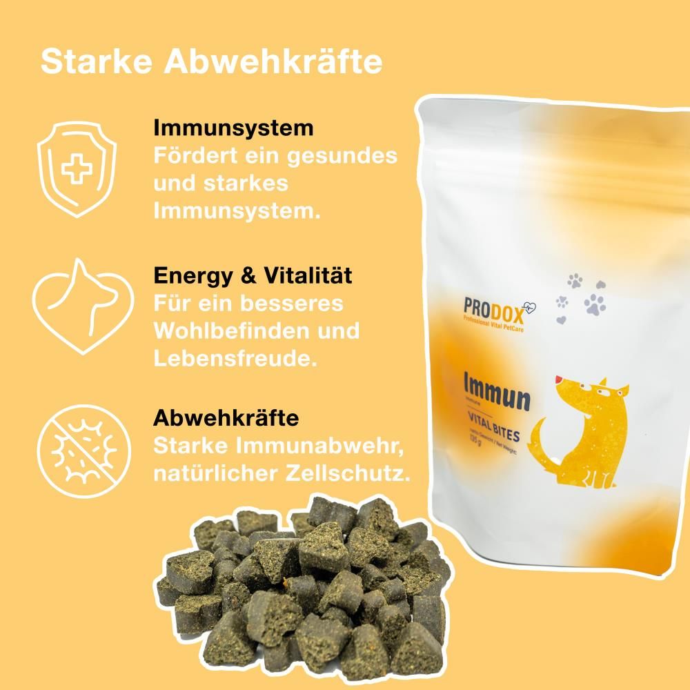 PRODOX Immun Vital Bites-Beutel mit Text und Illustrationen. Haufen von Leckerlis. Gelber Hintergrund.