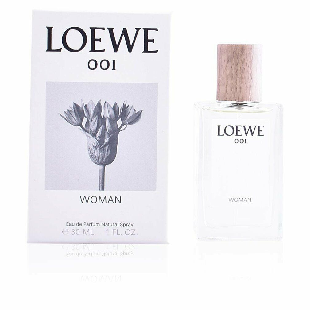 Loewe 001 Woman Eau de Parfum und Verpackung. Flakon neben weißer Schachtel mit floralem Motiv und Logo.