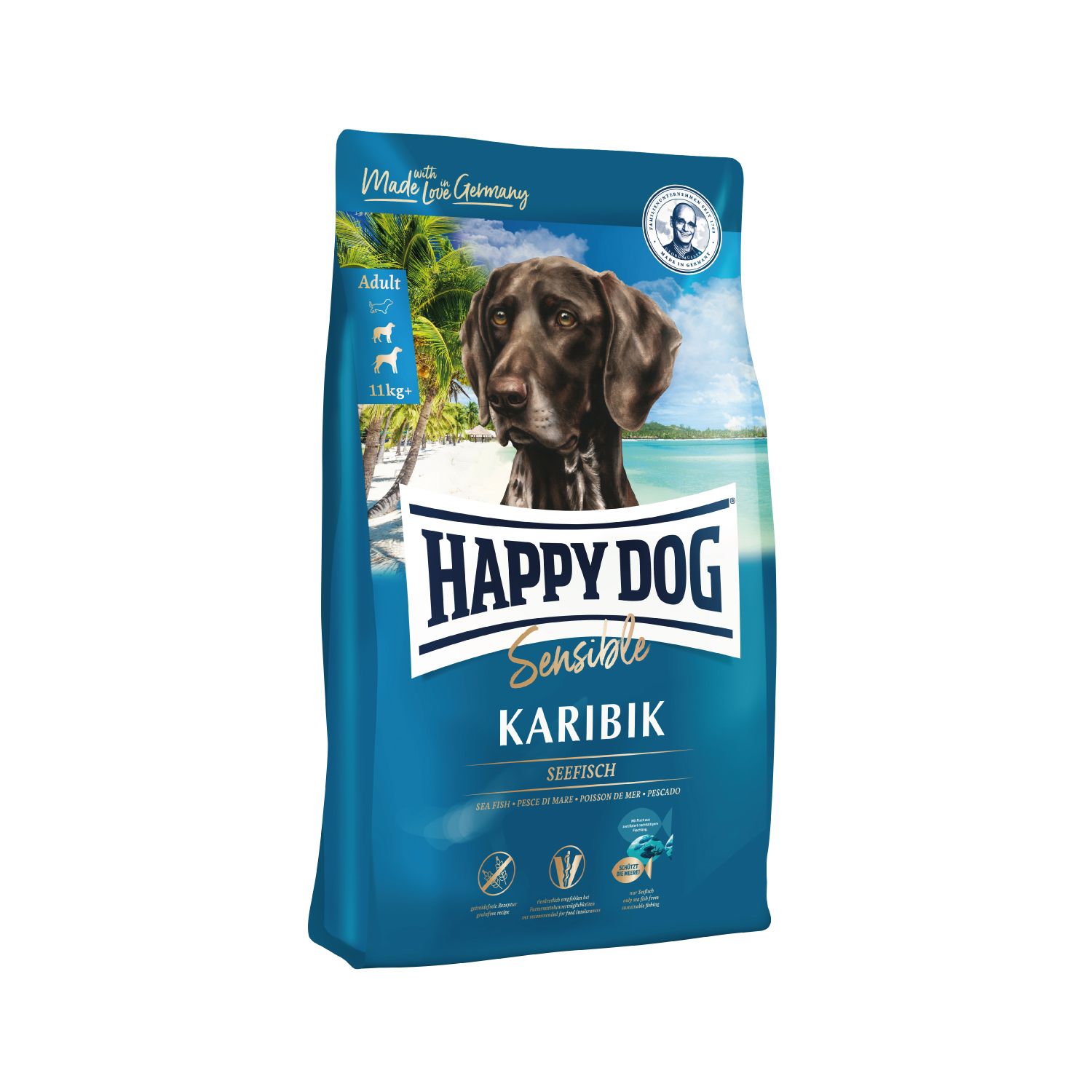 Blau-weiße Tüte mit Hundefutter. Aufschrift: HAPPY DOG Sensible Karibik. Bild eines Hundes. Made in Germany.