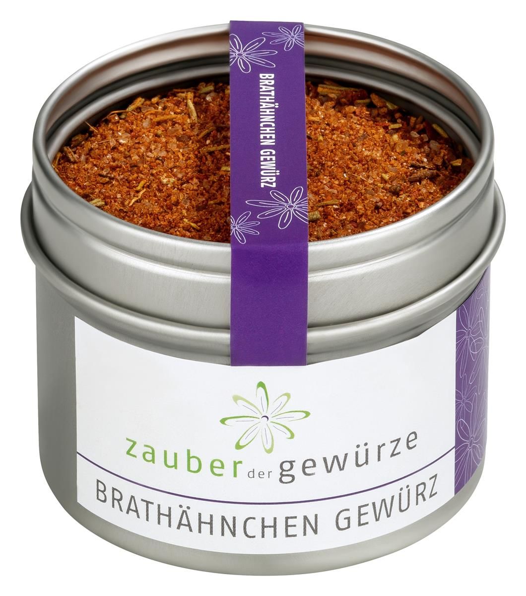 Gewürzmischung in Dose. Dose mit weißem Etikett und lila Streifen. Aufschrift: Zauber der Gewürze Brathähnchen Gewürz.