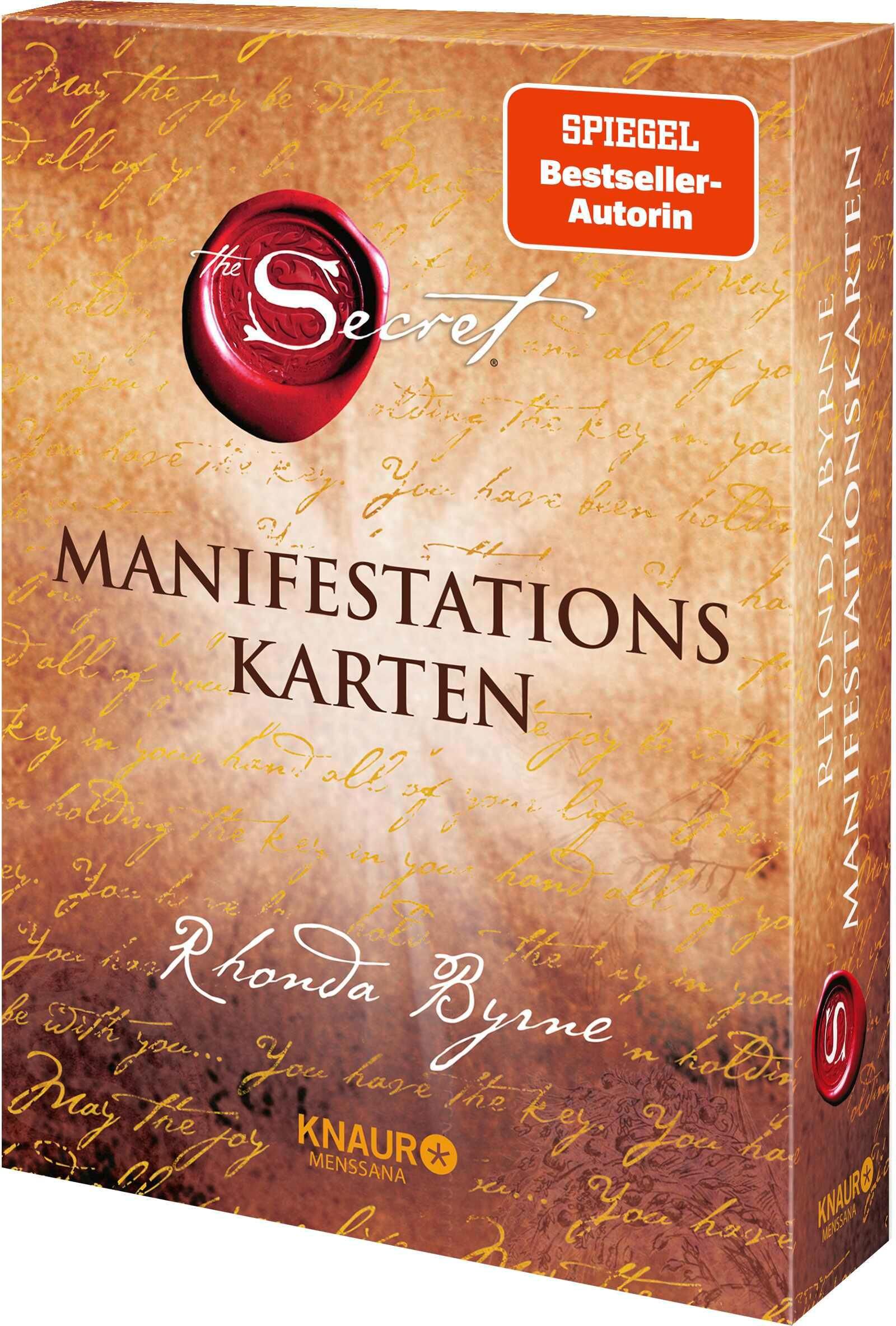 Kartenbox "Manifestationskarten". Titel, rotes Siegel, Autor: Rhonda Byrne. Aufkleber: Spiegel Bestseller-Autorin.