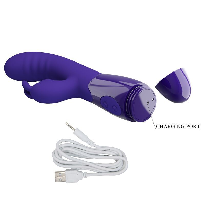 Violett farbiger Vibrator mit abnehmbarer Kappe. Ladekabel und Ladeanschluss sichtbar. Sicht von oben.