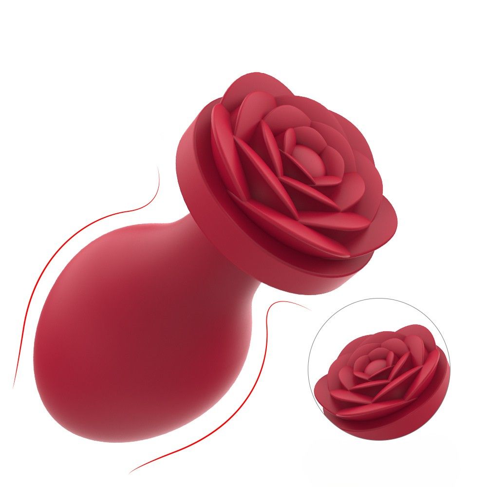 Roter Analplug mit Rosenbasis. Eine Nahaufnahme der Rosenbasis ist ebenfalls abgebildet.