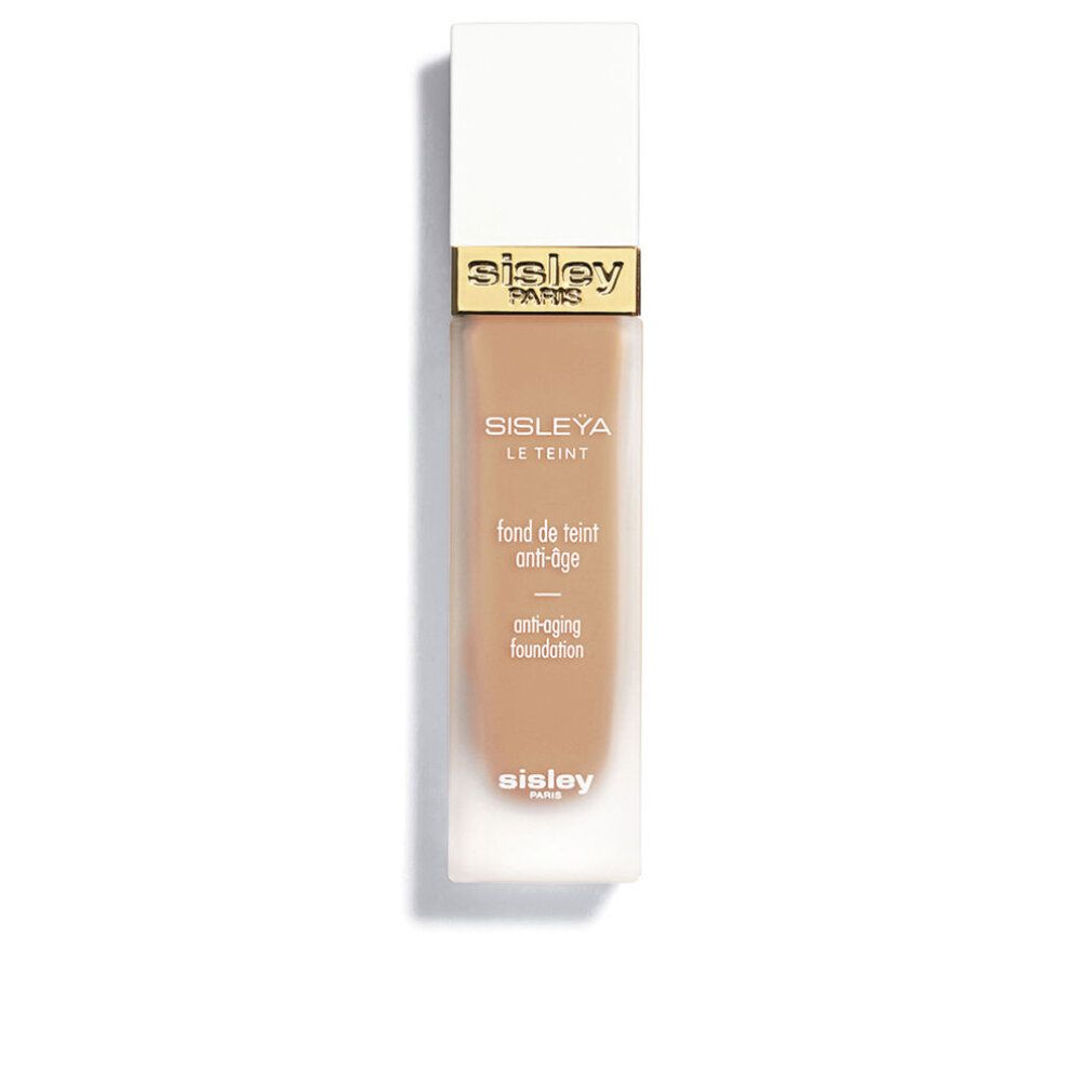 Sisley Sisleya Le Teint Foundation. Rechteckige Flasche mit weißem Deckel. Goldener Schriftzug. Aufschrift: Anti-Aging Foundation.