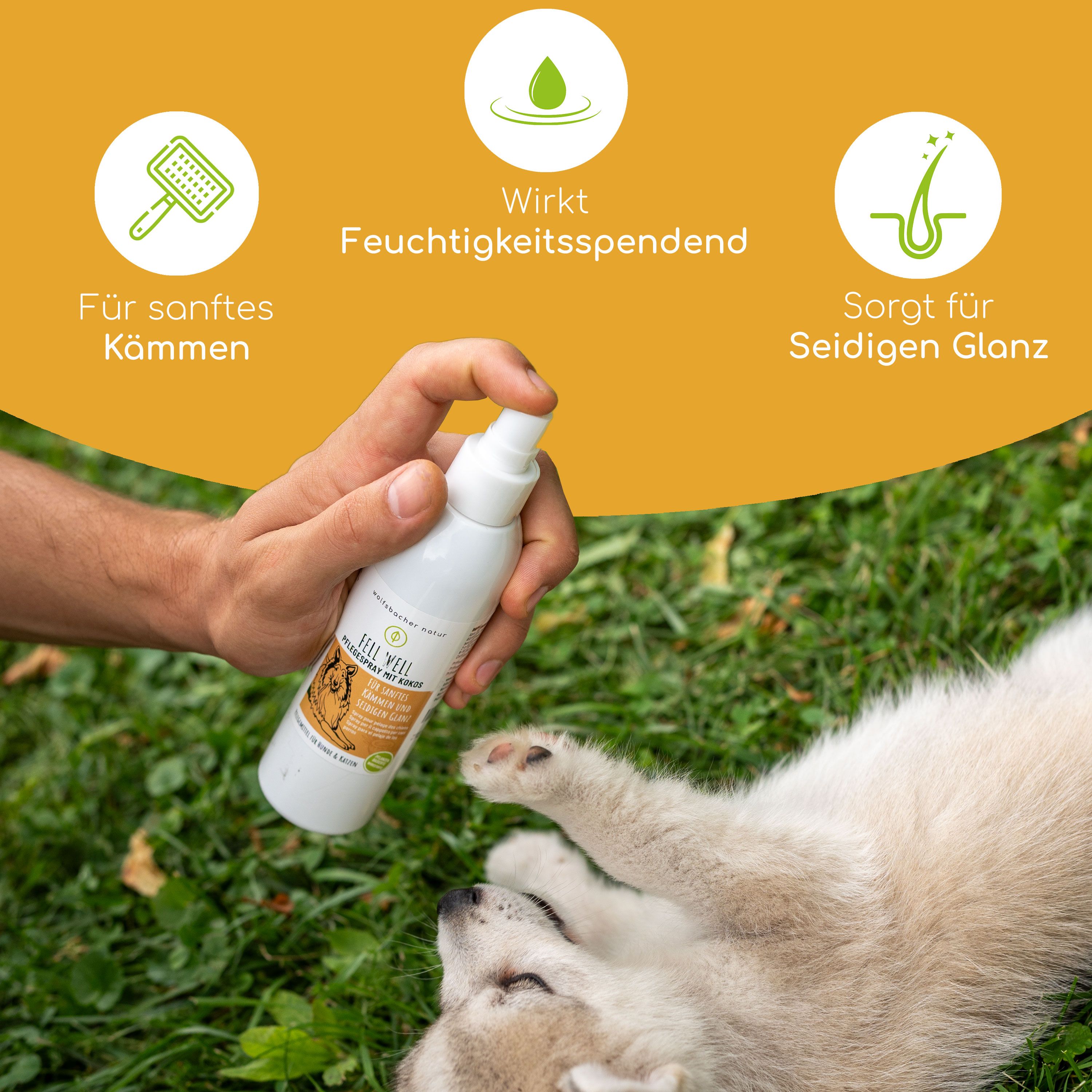 Person hält eine weiße Sprühflasche über einem Hund. Auf der Flasche steht Fell Well. Der Hund liegt im Gras.