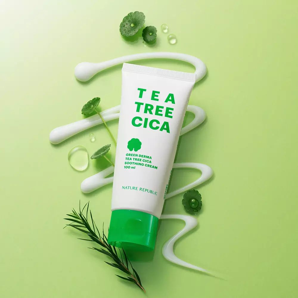 Weiße Tube mit grüner Kappe, umgeben von grünen Blättern und weißen Streifen. Aufschrift: TEA TREE CICA. Marke: NATURE REPUBLIC.