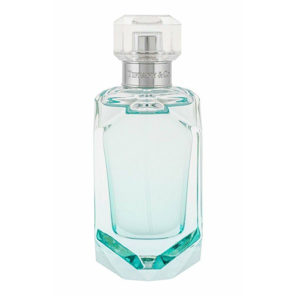 Hellblaues Parfümflakon mit silbernem Verschluss. Klarer, facettierter Glasboden. Transparenter Deckel.