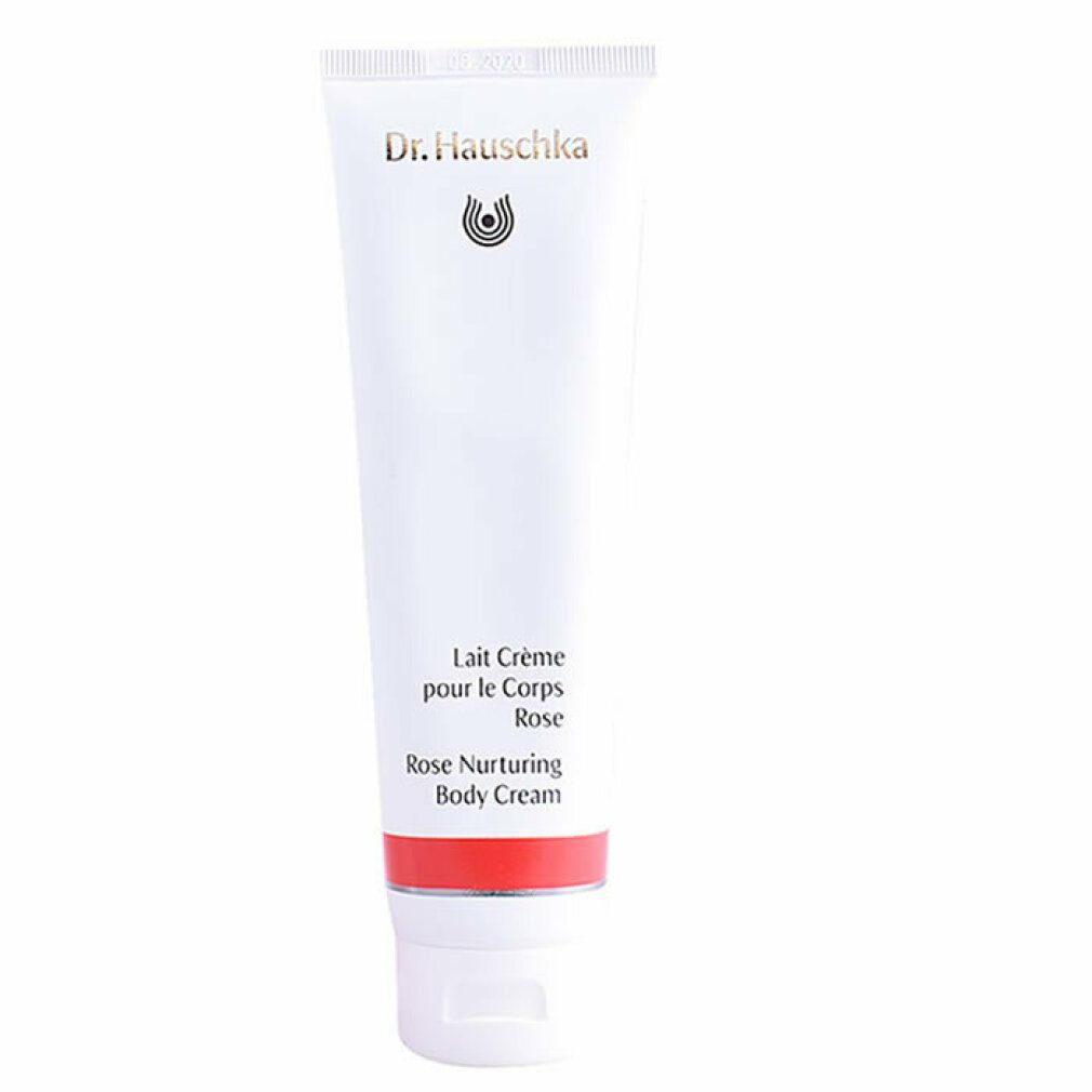 Weiße Tube mit rotem Streifen. Schriftzug: Dr. Hauschka, Rose Nurturing Body Cream. Produktverpackung.