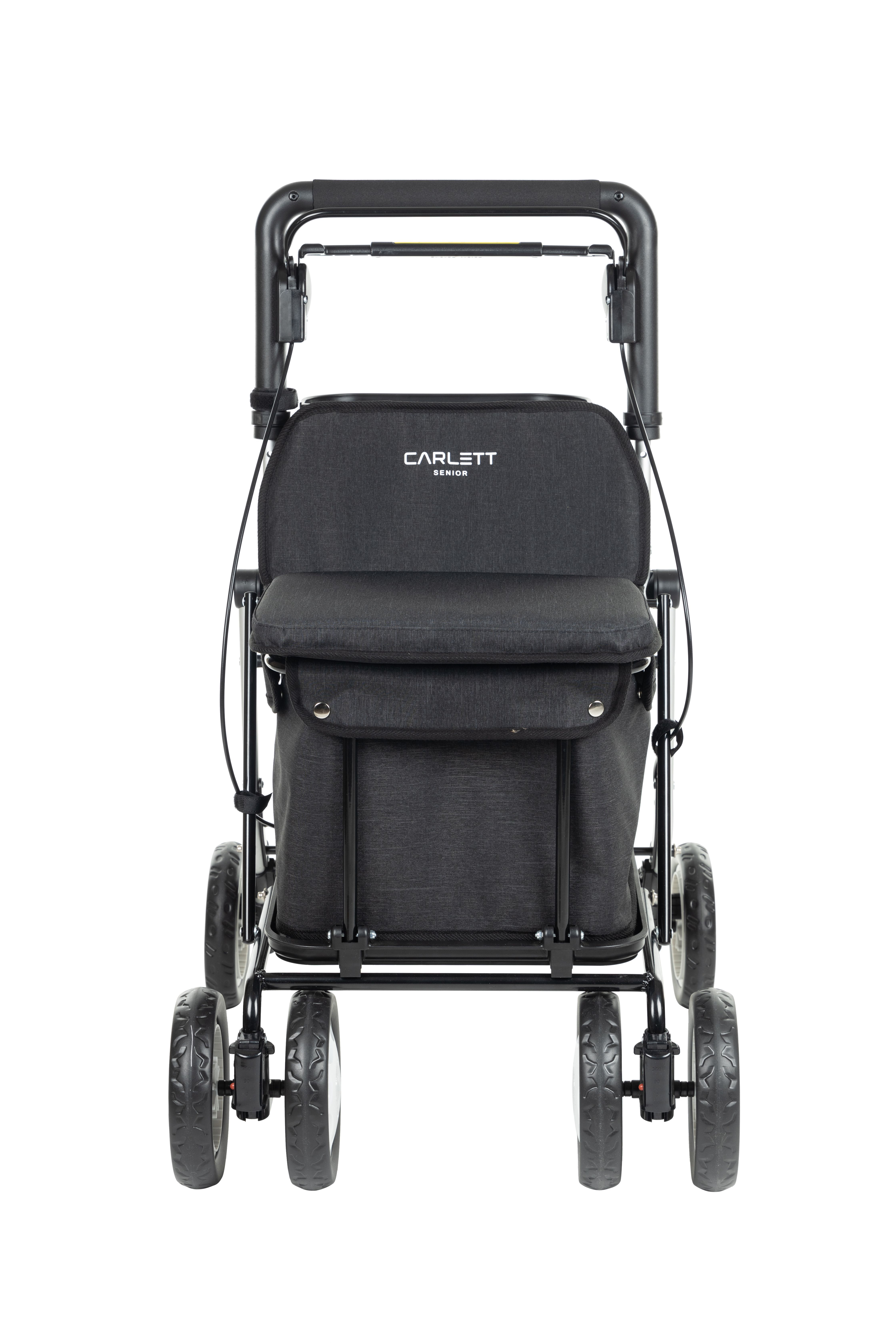 Gehstock mit Sitz. Schwarzes Gestell, grauer Sitz und Tasche. Carlett-Logo auf der Rückenlehne.