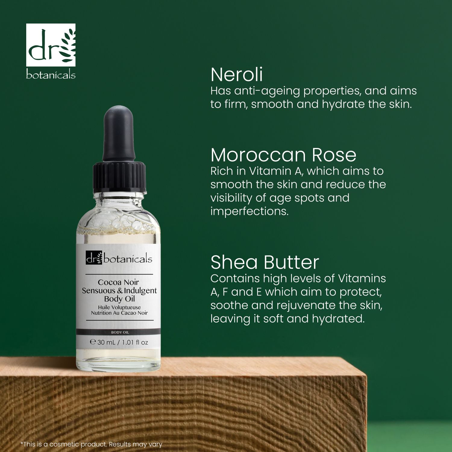 Körperöl-Flasche mit Pipette auf Holz. Text: Neroli, Moroccan Rose, Shea Butter. Marke: Dr Botanicals.