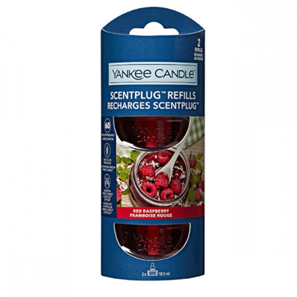 Yankee Candle Scentplug Nachfüllung, rote Himbeere. Zwei Nachfüllungen in blauer Verpackung. Produktabbildung mit Himbeeren.