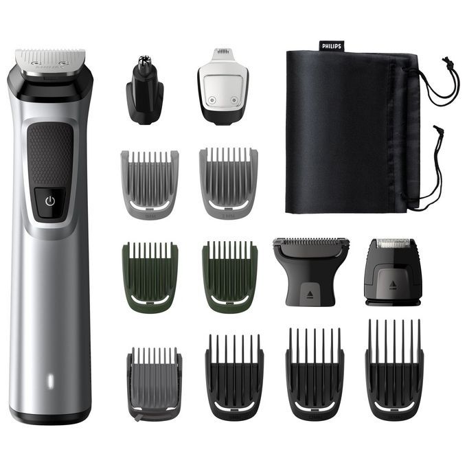 Philips MULTIGROOM Series 7000 MG7720/15. Un trimmer argentato con dettagli neri e accessori. Include accessori per barba, capelli e corpo. È inclusa anche una custodia nera con il logo Philips. Diverse guide di taglio di varie dimensioni.