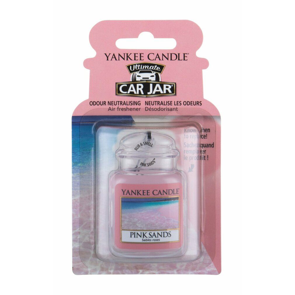 Lufterfrischer im Glasbehälter. Rosa Etikett mit "Pink Sands" und "Yankee Candle". In Blisterverpackung.