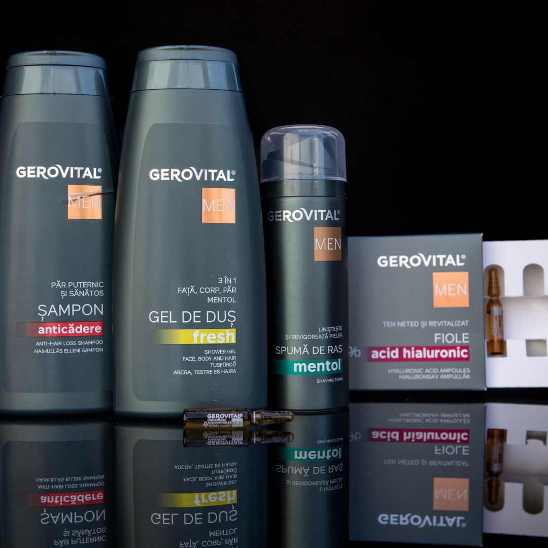 Mehrere Gerovital Men Produkte, darunter Shampoo, Duschgel, Rasiercreme und Ampullen mit der Aufschrift Fiole Anticadere.