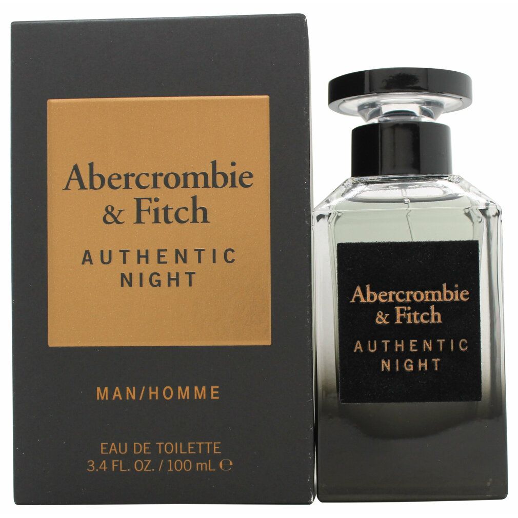 Flakon und Verpackung von Authentic Night Man Eau de Toilette Spray. Schwarze Verpackung mit goldenem Logo. Flakon mit schwarzem Verschluss.